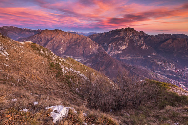 Sunset on Lecco mountains (Resegone, Due Mani) from the top of Coltignone mount, Lecco province, Lombardy, Italy, Europe