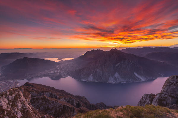 Sunset on Lecco mountains (Corni di Canzo, Cornizzolo, Rai, Barro) and lake Como from the top of Coltignone mount, Lecco province, Lombardy, Italy, Europe