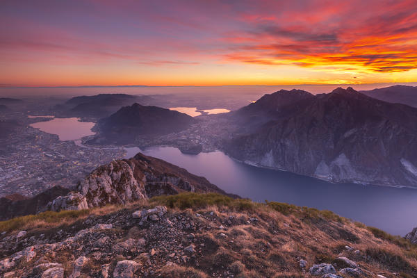 Sunset on Lecco and lake Como from the top of Coltignone mount, Lecco province, Lombardy, Italy, Europe