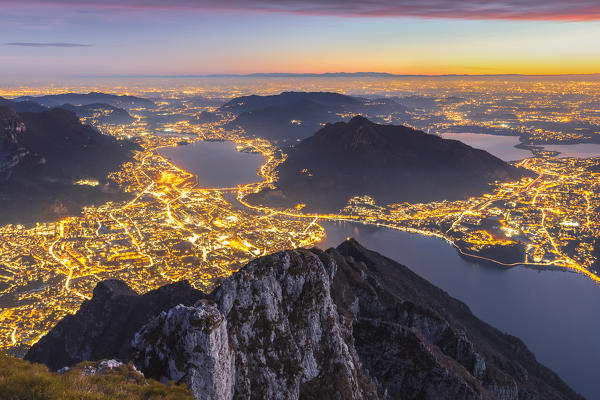 A night view on Lecco city from the top of Coltignone mount, Lecco province, Lombardy, Italy, Europe
