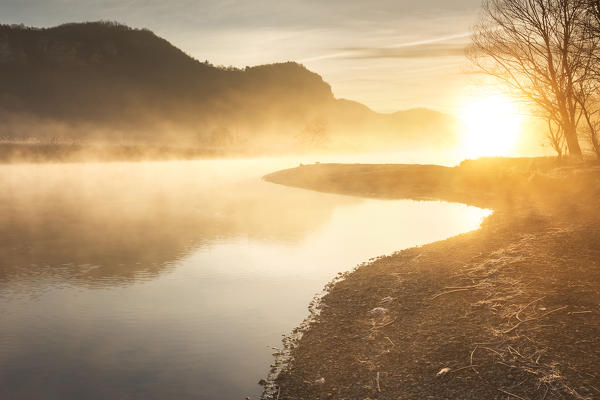 Foggy sunrise on Adda river, Airuno, Brianza, Lecco province, Lombardy, Italy, Europe