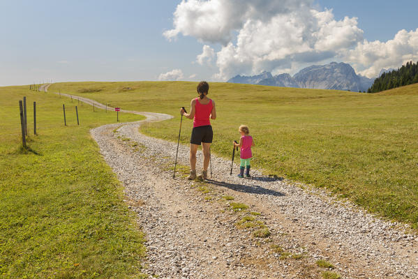 Mom teach her daughter to hiking, Cles, Non valley, Brenta group, Trento province, Trentino Alto Adige, Italy, Europe (MR)