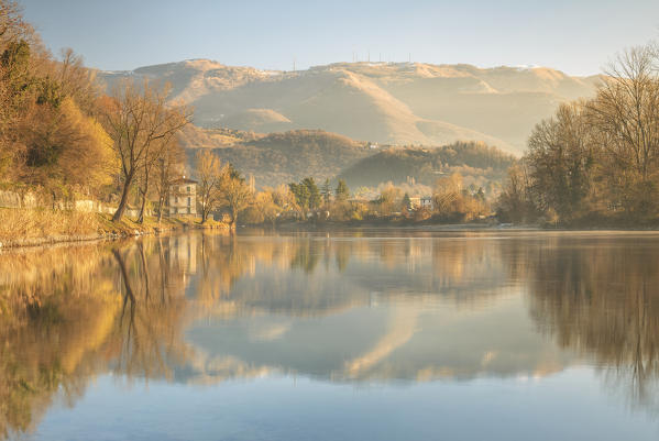 Morning reflections of Brivio village, Lecco province, Lombardy, Italy, Europe