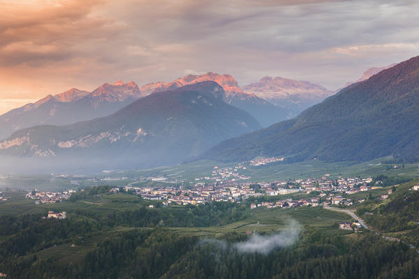 Sunrise on Cles village and Brenta group Dolomites, Non valley, Trento province, Trentino Alto Adige, Italy, Europe