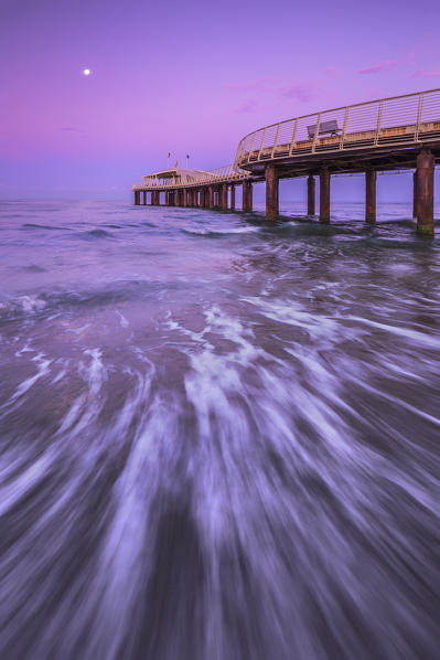 Sunrise on Lido di Camaiore pier with moon, Lucca province, Versilia, Tuscany, Italy, Europe