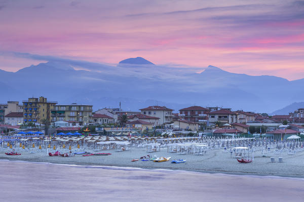 Sunrise on Lido di Camaiore beach and Apuan Alps, Lucca province, Versilia, Tuscany, Italy, Europe