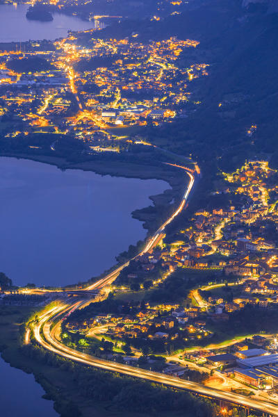 The town of Civate and Suello illuminated, highway 36 of lake Como and Spluga, dusk from the top of Barro mount, Galbiate, Brianza, Lecco province, Lombardy, Italy, Europe