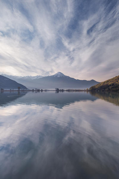 Legnone mount (Lecco province) reflected into Mera river from Dascio village, Sorico, Riserva Naturale Pian di Spagna e Lago di Mezzola, lake Como, Como province, Lombardy, Italy, Europe