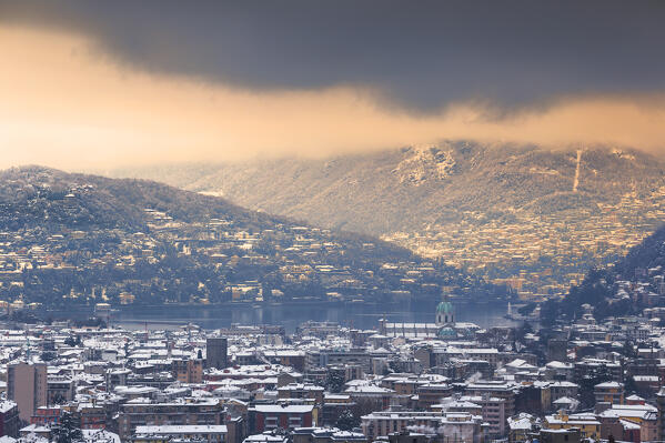 Sunset on Como city after the snowfall, lake Como, Lombardy, Italy, Europe