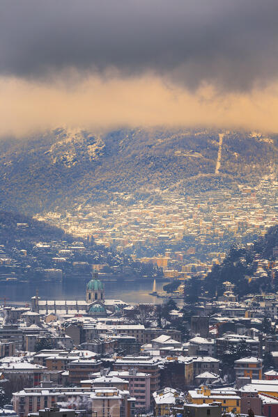 Sunset on Como city after the snowfall, lake Como, Lombardy, Italy, Europe
