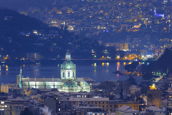 A night view on Como city after the snowfall, Como's cathedral, lake Como, Lombardy, Italy, Europe