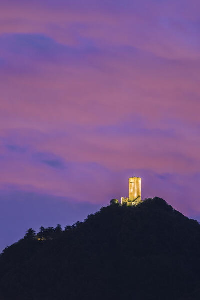 Baradello tower (Castel Baradello) illuminate at Dusk, Como city, lake Como, Lombardy, Italy, Europe