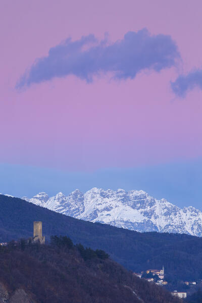 Sunset on Baradello tower (Como city) and Resegone mount (Lecco province), lake Como, Lombardy, Italy, Europe
