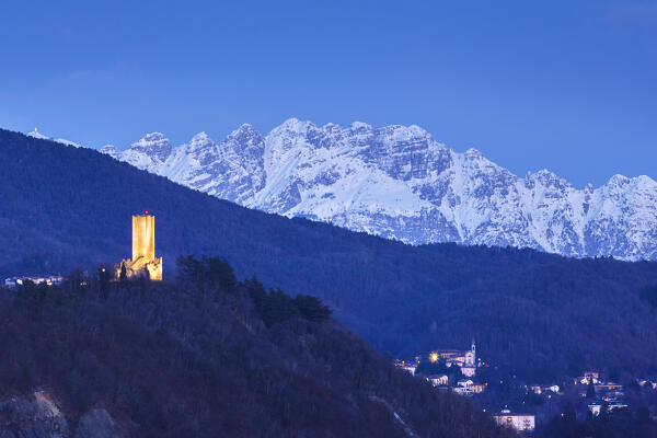 Dusk on Baradello tower (Como city) and Resegone mount (Lecco province), lake Como, Lombardy, Italy, Europe