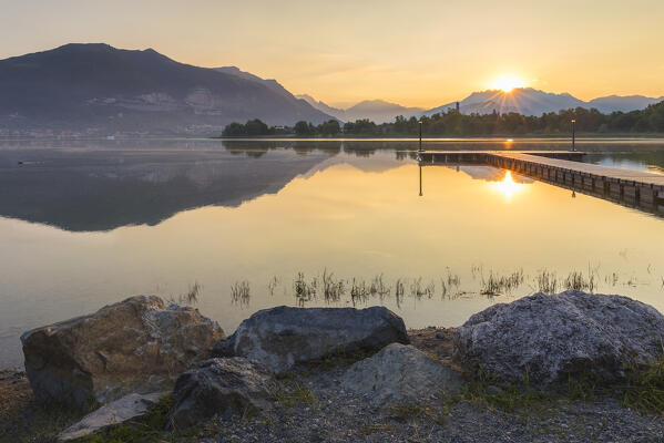 Sunrise on Pusiano lake from Casletto lakefront, Rogeno, Como province, Lombardy, Italy, Europe