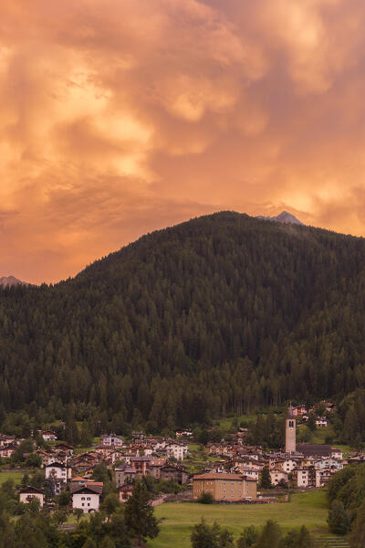 Sunset on the Ossana village with Mammatus clouds, Sole valley (val di Sole), Trento province, Trentino-Alto Adige, Italy, Europe