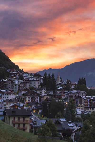 Fire sunrise on Mezzana village, Sole valley (val di Sole), Trento province, Trentino-Alto Adige, Italy, Europe