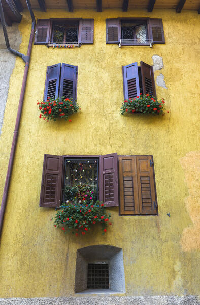 A facade of a home, Pellizzano village, Sole valley (val di Sole), Trento province, Trentino-Alto Adige, Italy, Europe