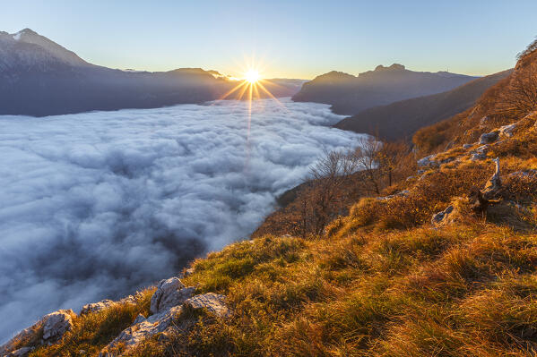 First light on lake Como (ramo di Lecco) covered by the fog, Barni, Como province, Lombardy, Italy, Europe