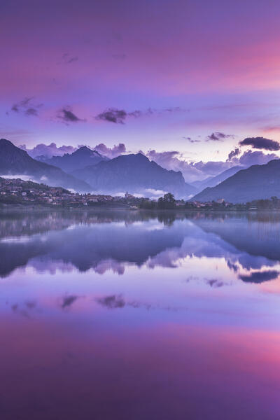Pink sunrise on lake Annone, Brianza, Lecco province, Lombardy, Italy, Europe