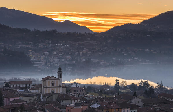 Sunrise on Civate village, lake Annone, Brianza, Lecco province, Lombardy, Italy, Europe