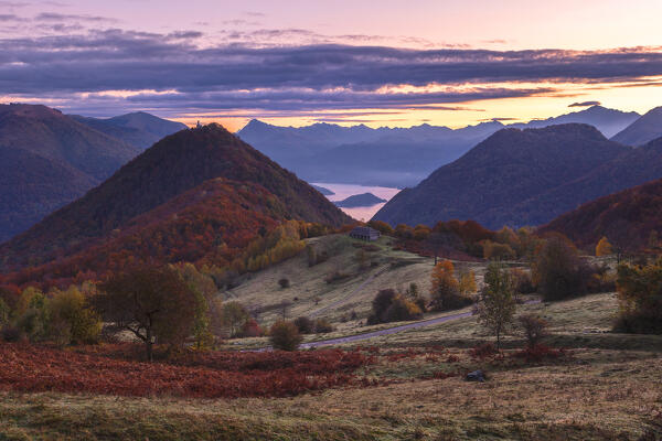 Autumnal dawn on Piano delle Alpi. Cerano d'Intelvi, Intelvi valley (val d'Intelvi), lake Como, Como province, Lombardy, Italy, Europe