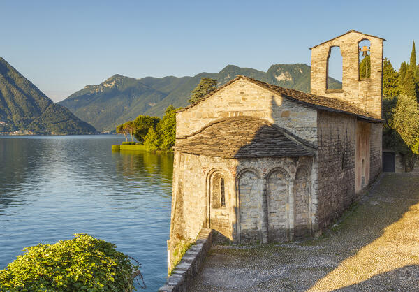 Morning lights on St. Giacomo church (Chiesa di San Giacomo), Ossuccio village, lake Como, Como province, Lombardy, Italy, Europe