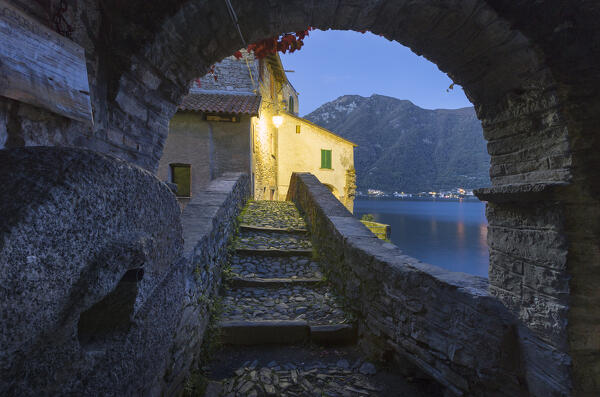 A view of Nesso village from roman bridge at dawn, lake Como, Como province, Lombardy, Italy, Europe