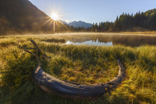 First lights morning on Nambino lake (Lago Nambino), Val Nambino, Madonna di Campiglio, Trento province, Trentino alto adige, Italy, Europe
