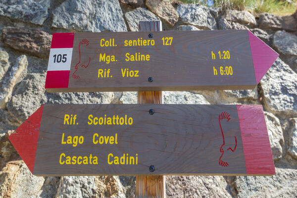 A signposting of a path to Covel lake and Covel waterfall, Peio valley, Stelvio National Park, Trento province, Trentino Alto Adige, Italy, Europe
