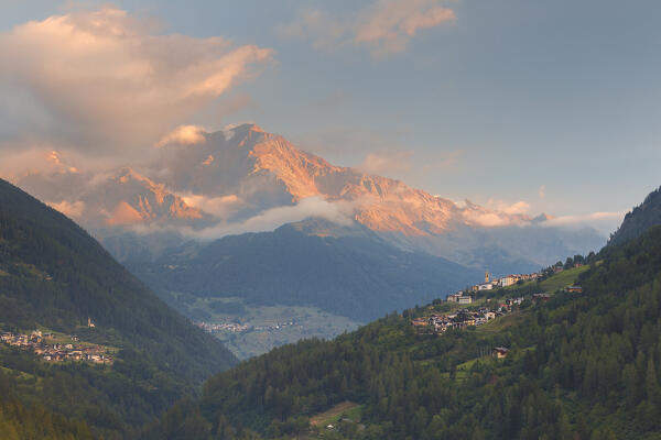 Sunrise on Gruppo Ortles-Cevedale alps and Strombiano village, Stelvio National Park, Rhaetian Alps. View from Ossana village, Sun valley (val di Sole), Trento province, Trentino alto adige, Italy, Europe