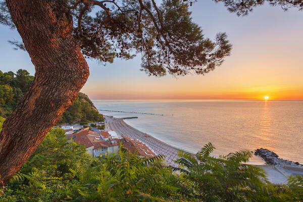 Sunrise on Adriatic sea from Numana beach, Numana, Riviera del Conero, Ancona province, Marche, Italy, Europe