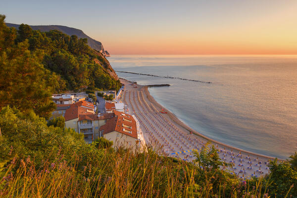 Sunrise on Adriatic sea from Numana beach, Numana, Riviera del Conero, Ancona province, Marche, Italy, Europe