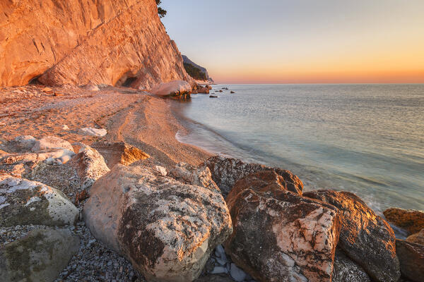 First lights morning on Spiaggia del Frate beach, Adriatic sea, Numana, Riviera del Conero, Ancona province, Marche, Italy, Europe