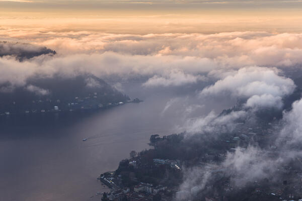 Cloudy sunrise on lake Como, Brunate and Cernobbio town, Como province, Lombardy, Italy, Europe