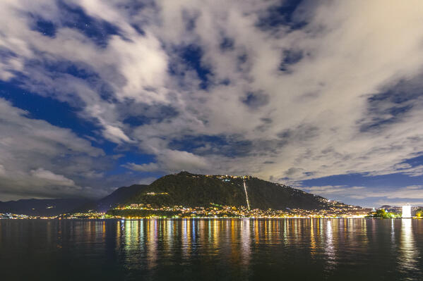 Night lights over Brunate and Como city, lake Como, Lombardy, Italy, Europe