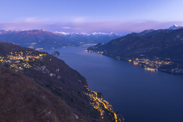 Dawn on lake Como (Lecco branch), Civenna, Oliveto Lario and Lierna villages illuminated, Como and Lecco provinces, Lombardy, Italy, Europe