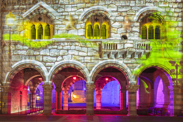 Broletto and Santa Maria Assunta cathedral illuminated and animated at night in the Christmas time, Città dei Balocchi, Como city, Lombardy, Italy, Europe