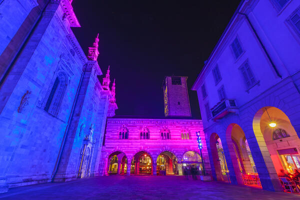 Broletto and Santa Maria Assunta cathedral illuminated by night in the Christmas time, Città dei Balocchi, Como city, Lombardy, Italy, Europe