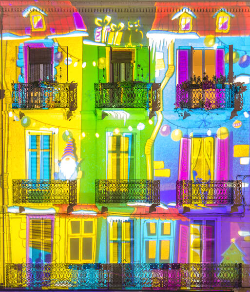 A detail of homes in the Piazza del Duomo square illuminated by night in the Christmas time, Città dei Balocchi, Como city, Lombardy, Italy, Europe