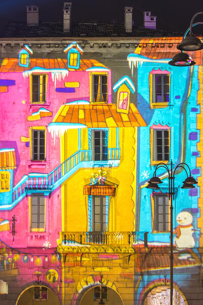 A detail of homes in the Piazza del Duomo square illuminated by night in the Christmas time, Città dei Balocchi, Como city, Lombardy, Italy, Europe