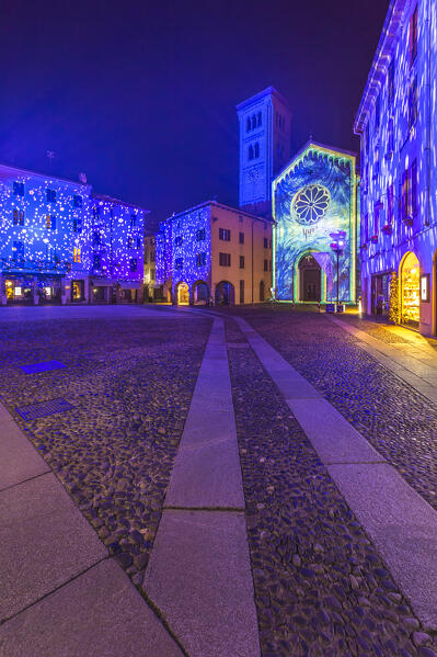 Piazza San Fedele square illuminated by night in the Christmas time, Città dei Balocchi, Como city, Lombardy, Italy, Europe