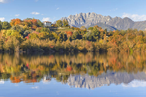 Autumn reflections on Sartirana lake and Resegone mount, Sartirana, Merate, Brianza, Lecco province, Lombardy, Italy, Europe