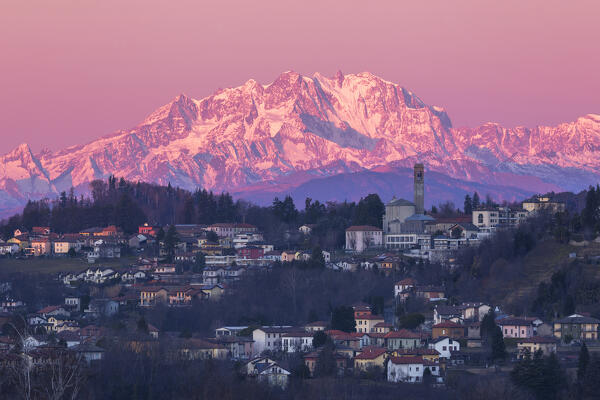 Sunrise on Rosa mount massif (Italy-Switzerland), and Uggiate Trevano village, Como province, Lombardy, Italy, Europe