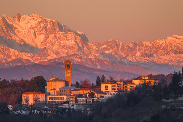 Sunrise on Rosa mount massif (Italy-Switzerland), and Uggiate Trevano village, Como province, Lombardy, Italy, Europe