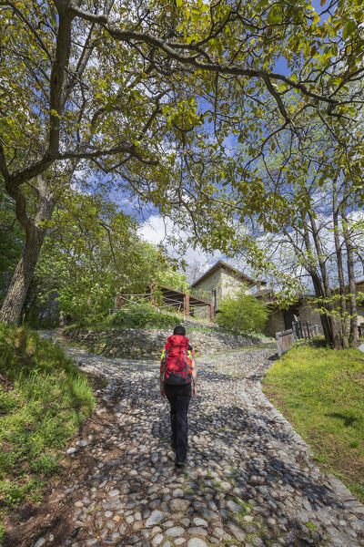 A walker reach the Cascina Respaù hostel, Spina Verde, Como, lake Como, Lombardy, Italy, Europe (MR) 