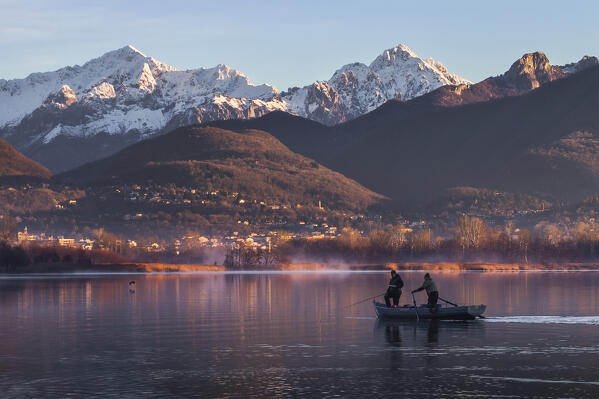 Fishermen on Alserio lake, Parco regionale della Valle del Lambro, Brianza, Como province, Lombardy, Italy, Europe