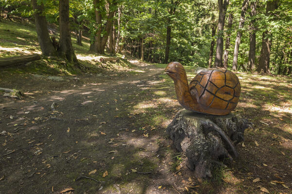 Croce dell'uomo path with a wood sculptures, Cernobbio, lake Como, Como province, Lombardy, Italy, Europe