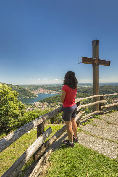 Girl relaxes look at the lake Como from Croce dell'uomo, Cernobbio, Como province, Lombardy, Italy, Europe (MR)