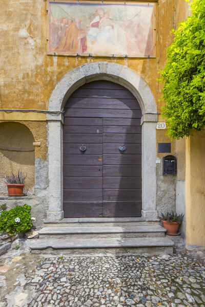 A door entrance of St. Donato hermitage (Eremo di San Donato), Como, lake Como, Lombardy, Italy, Europe